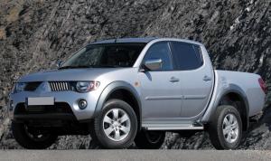 Коврик в багажник в багажник Mitsubishi L200 4 (2006-2015) с бортиком